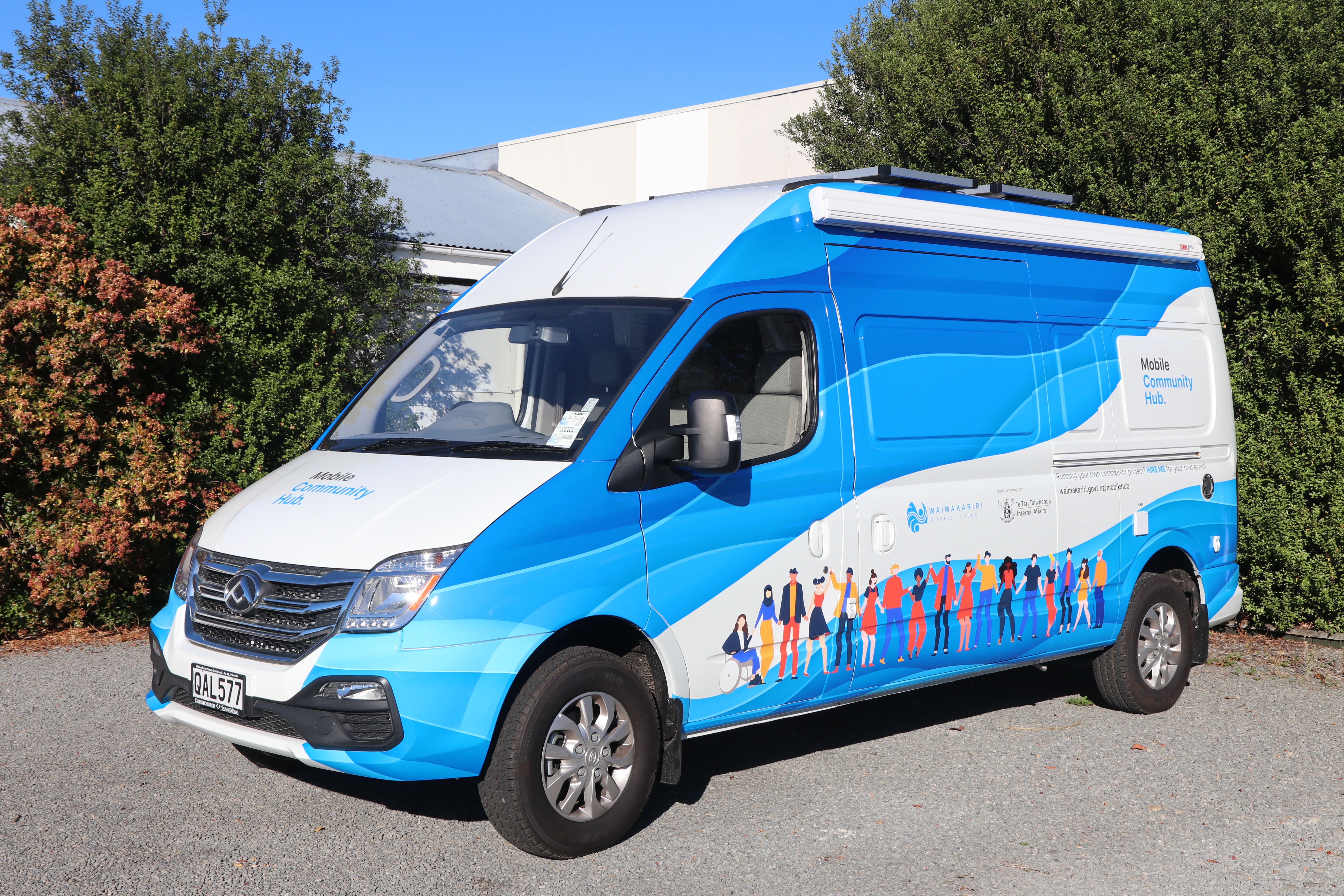 van parked on gravel carpark